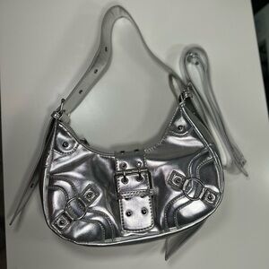 Silver buckle shoulder bag